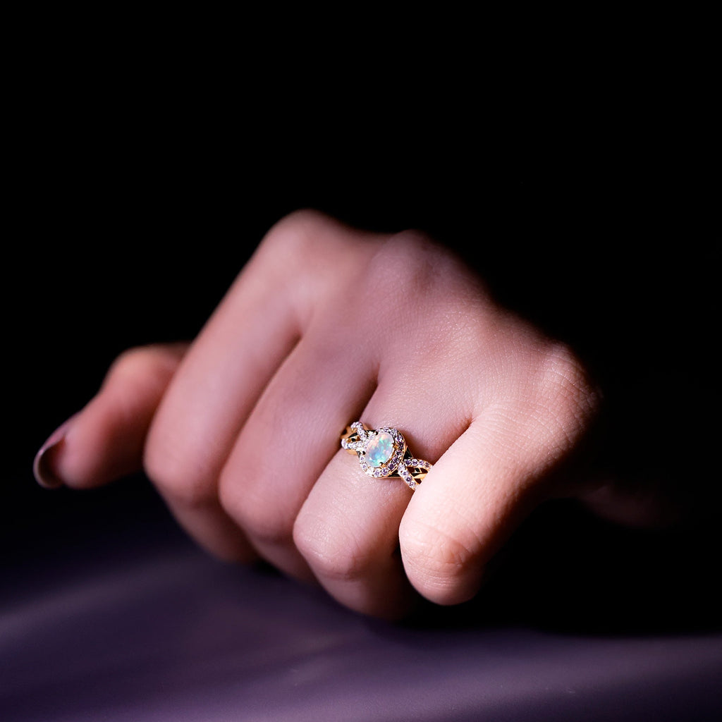 Oval Ethiopian Opal Designer Engagement Ring with Diamond Halo